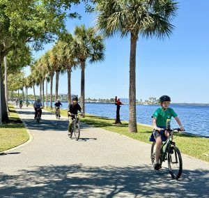 Kids Cycling on the Sanford Riverwalk